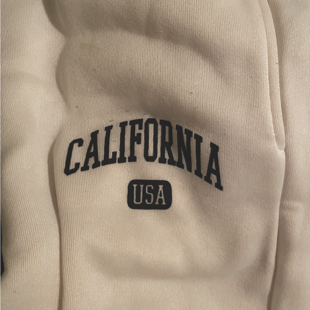 3 pack sweatpants. Brown, black, and white.